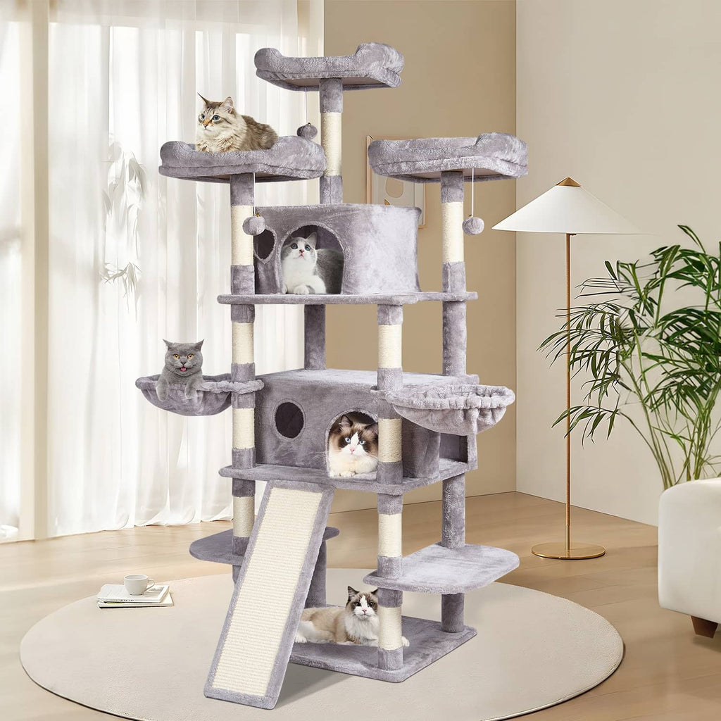 Light gray multi-level cat tree with plush condos and stacked platforms in a room