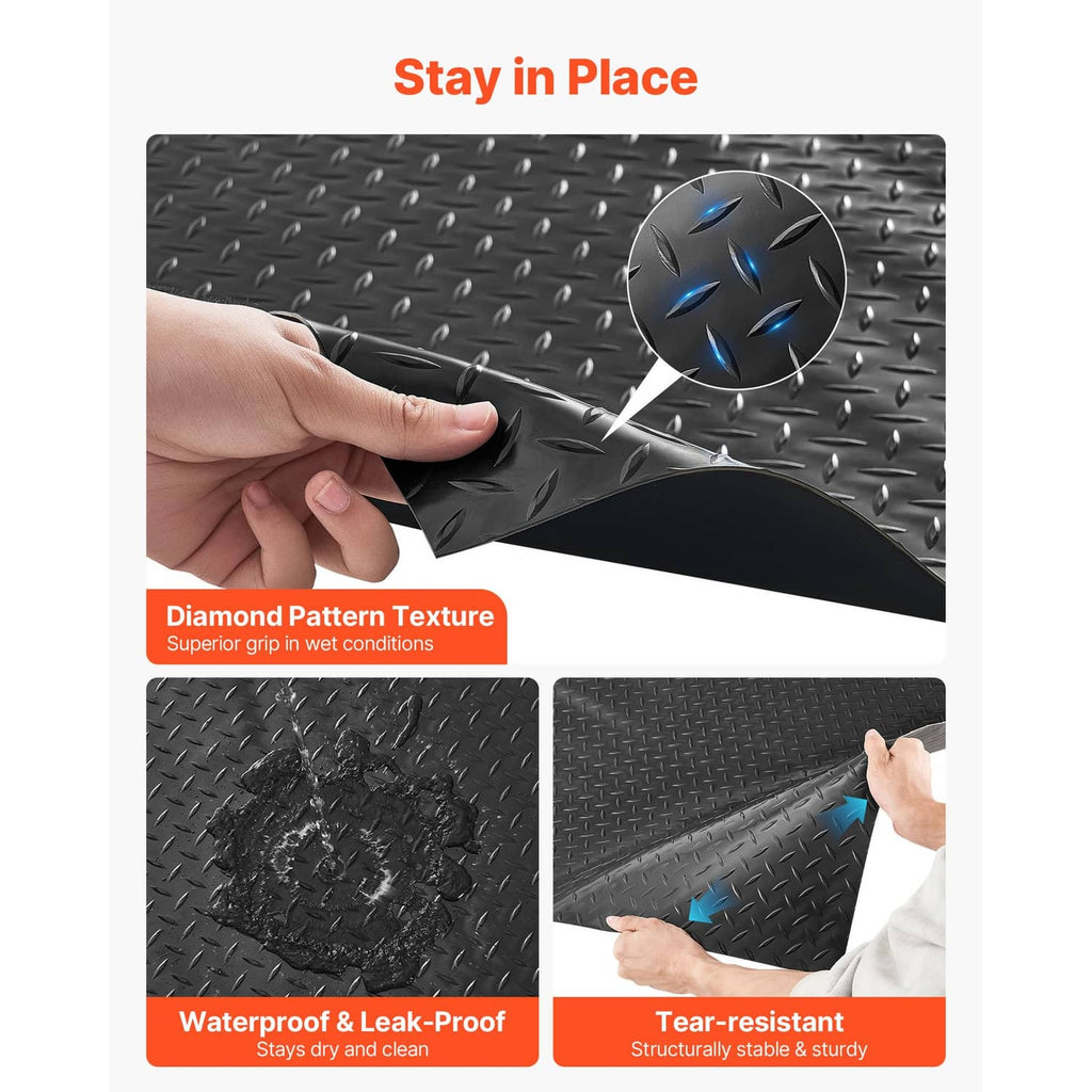 Black garage floor mat with diamond pattern texture and stay-in-place grip surface