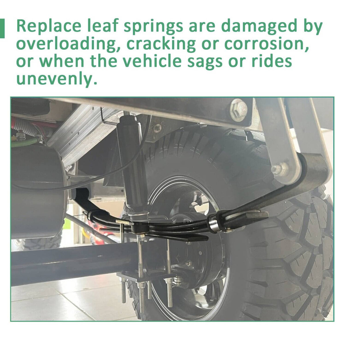 Rear underside view showing black A-arm lift kit components and leaf spring mount