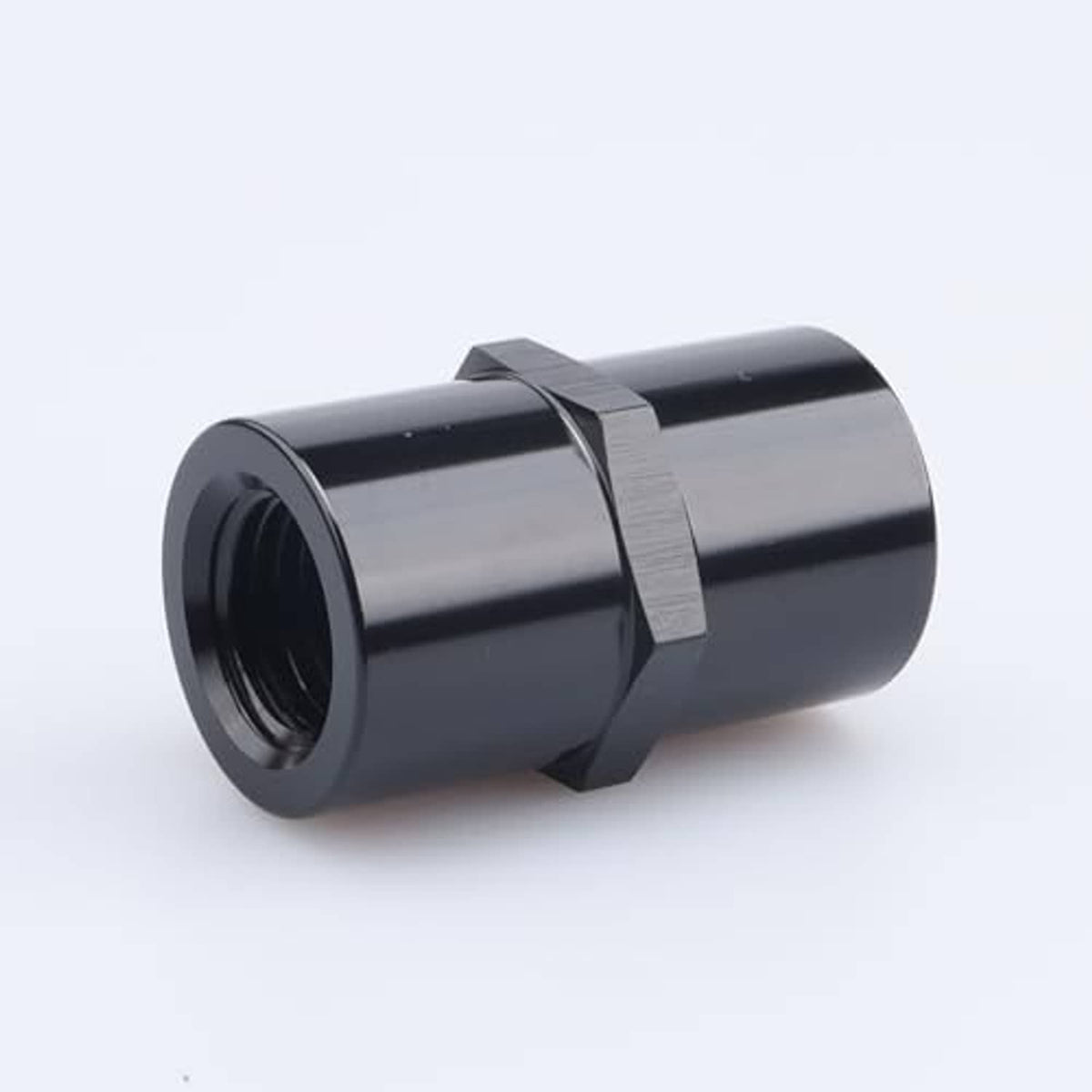 Black 1/4 in NPT female piping coupler fitting, angled view with internal thread opening