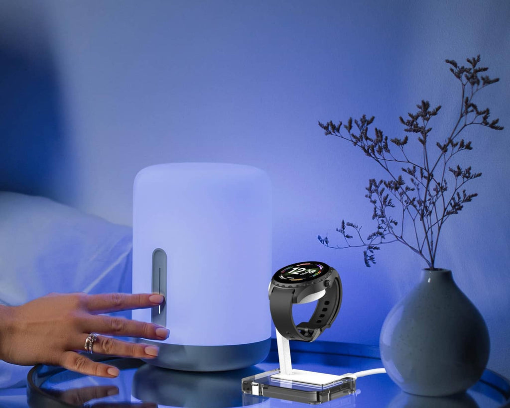 White smartwatch charging stand with clear base and watch dock, 4-pin design.