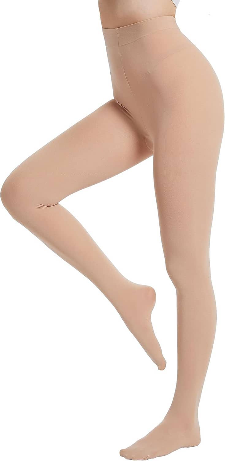 Nude opaque footed tights close-up, smooth leg finish to foot opening