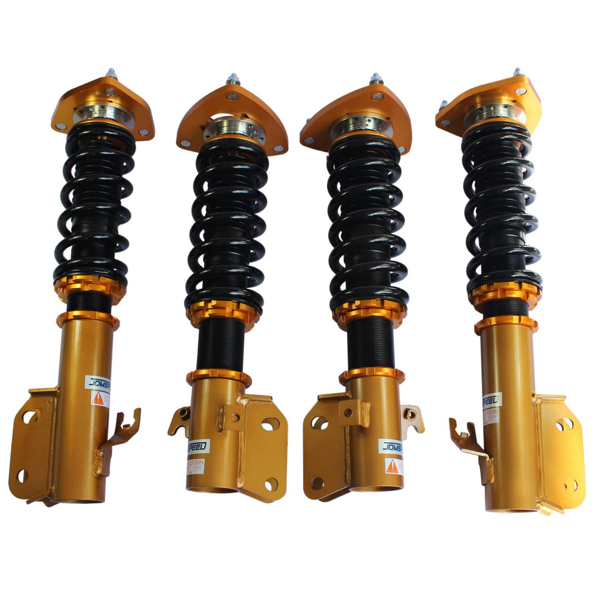 Set of four gold coilover struts with black coil springs and orange adjustment caps