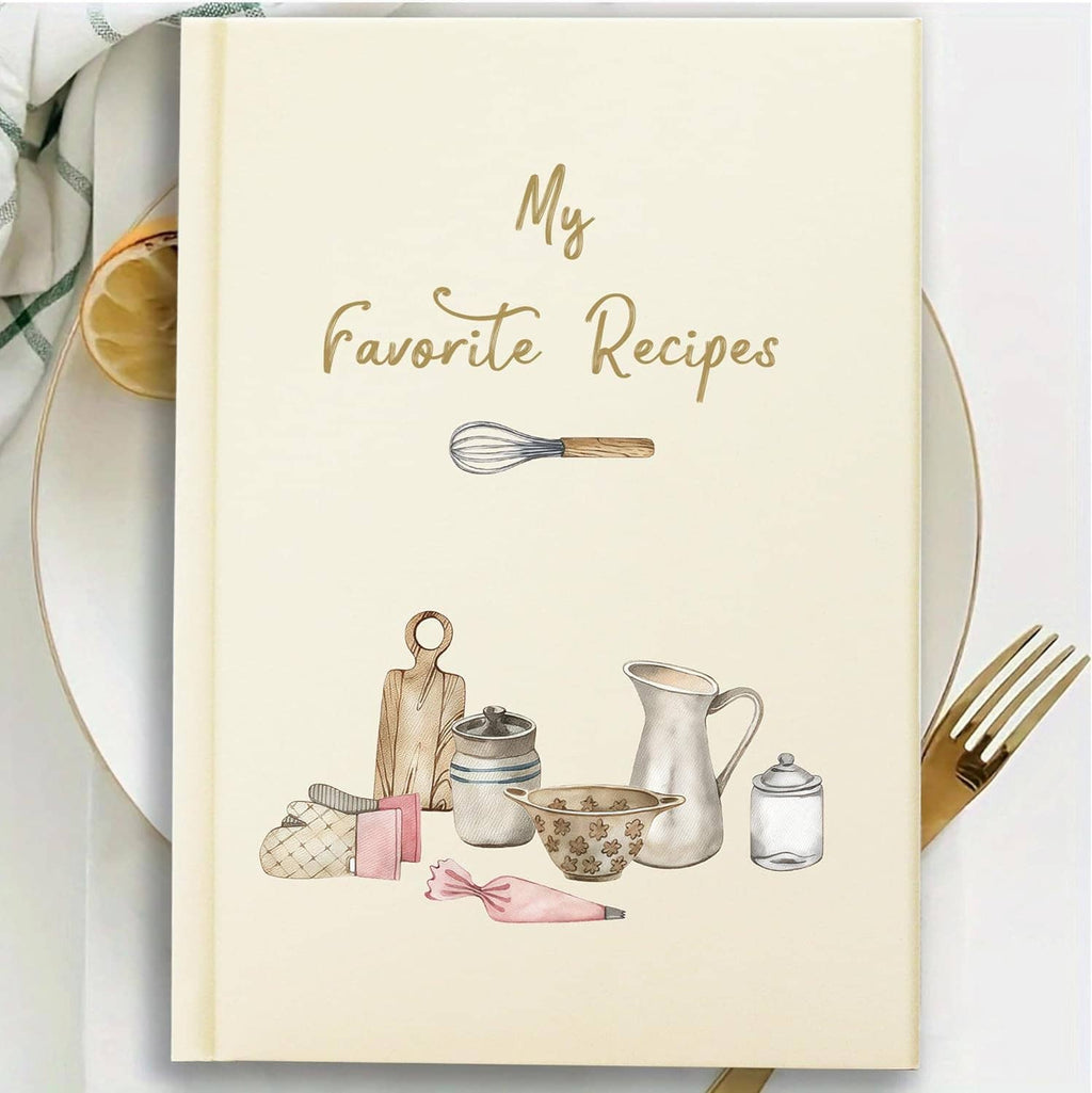 Cream hardcover recipe book placed flat, “My Favorite Recipes” title with cooking icons