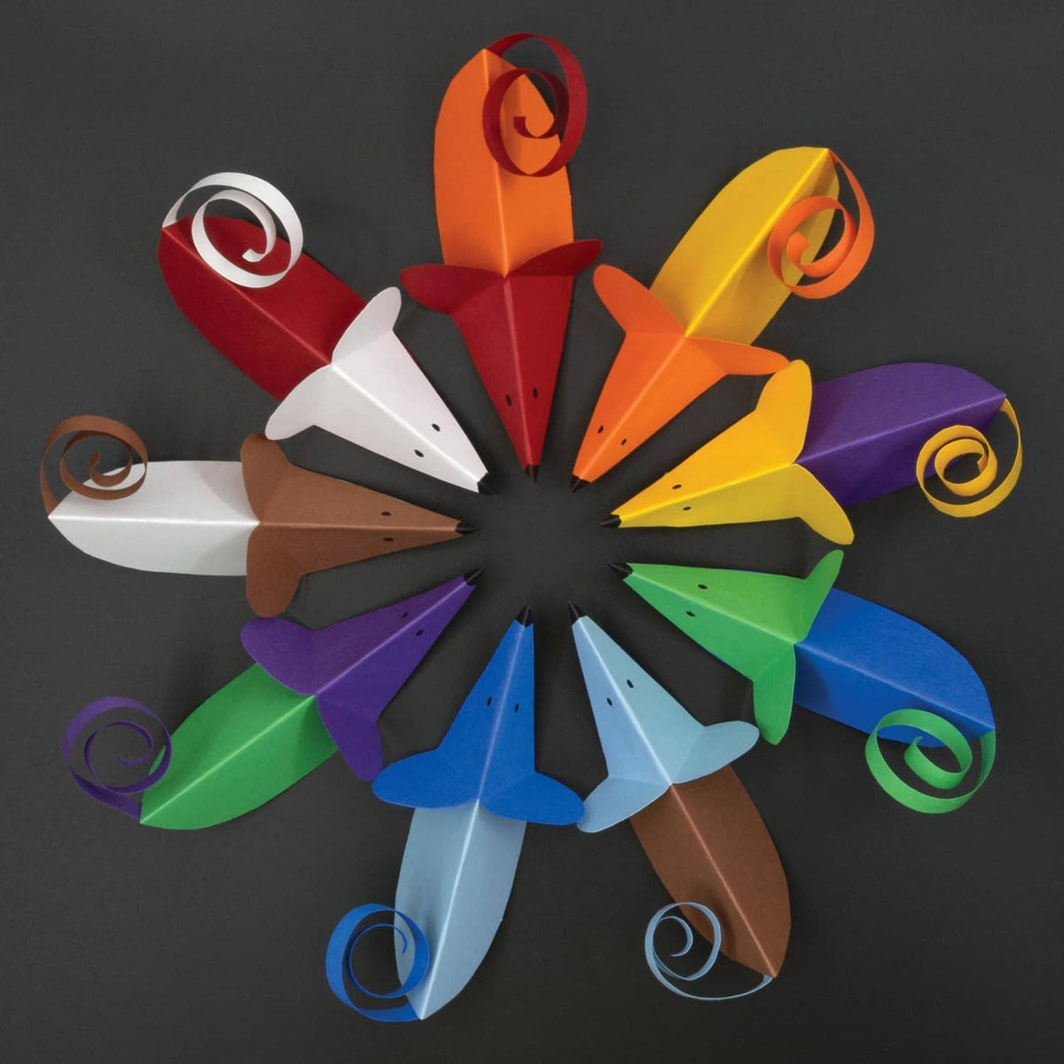 Assorted-color construction paper rolls fanned in a circular design