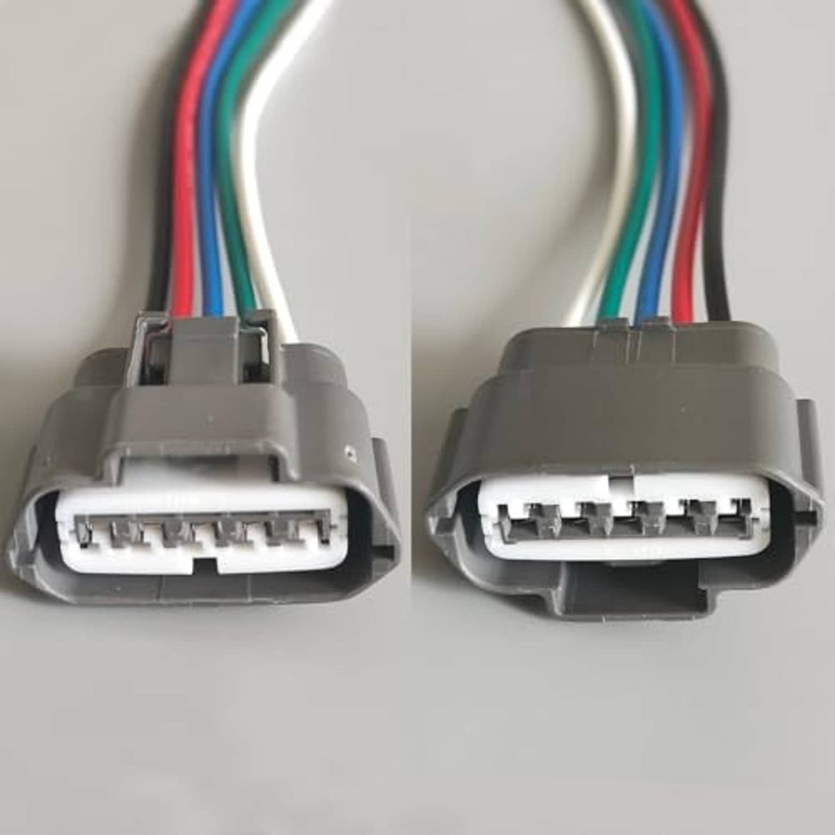 Fuel pump harness connector pair with gray 5-pin housings and colored wire leads