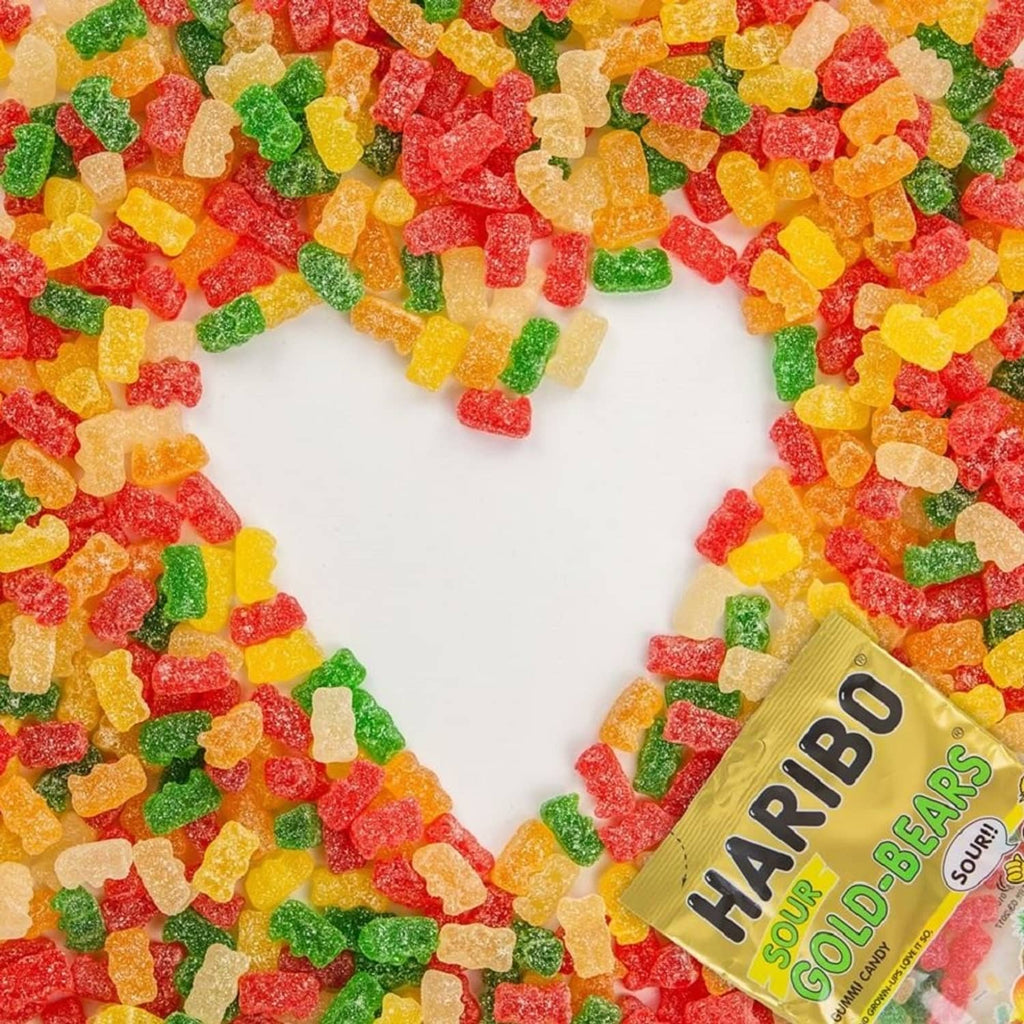 Heart made of sour gummy bear candies with a small Goldbears pouch label
