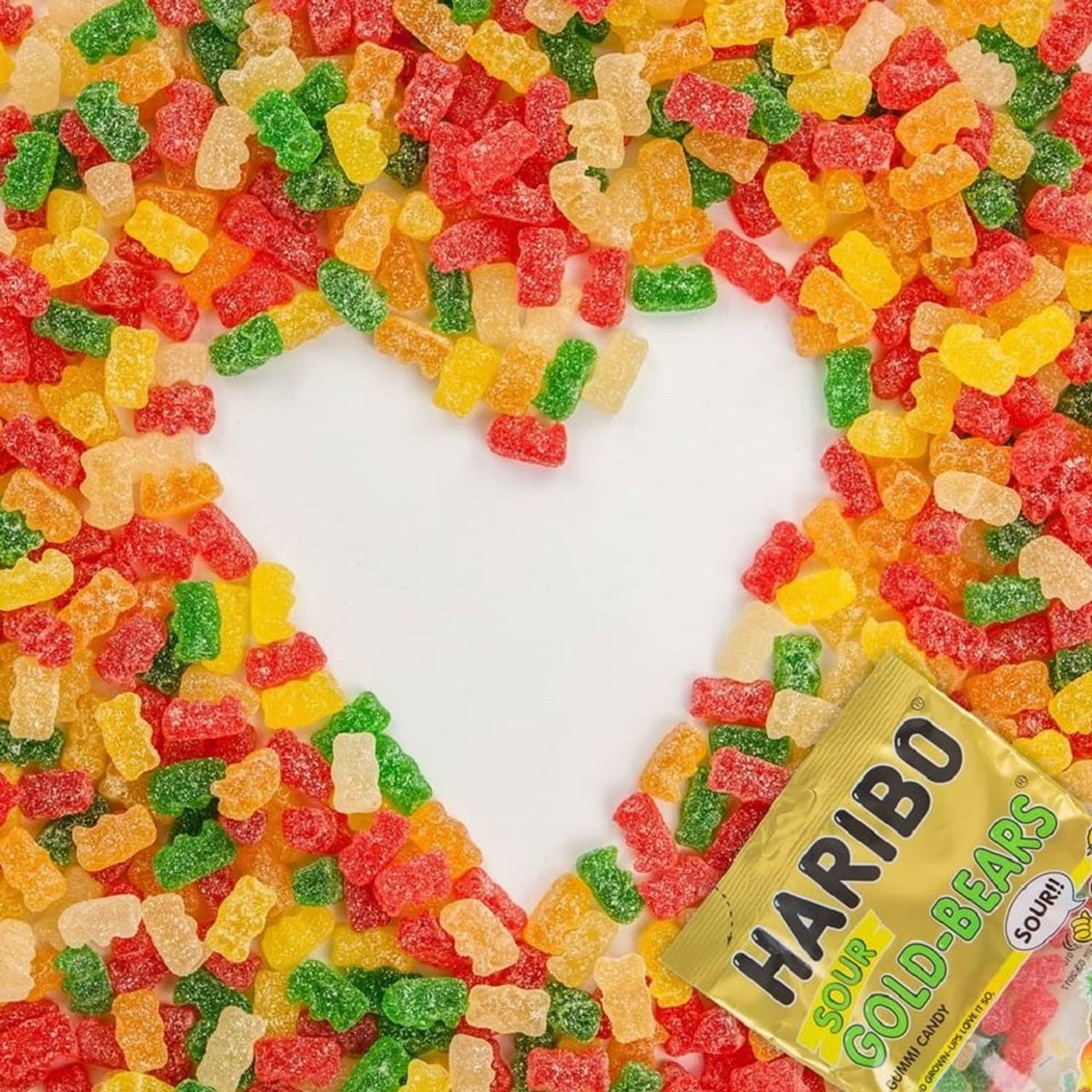 Heart made of sour gummy bear candies with a small Goldbears pouch label