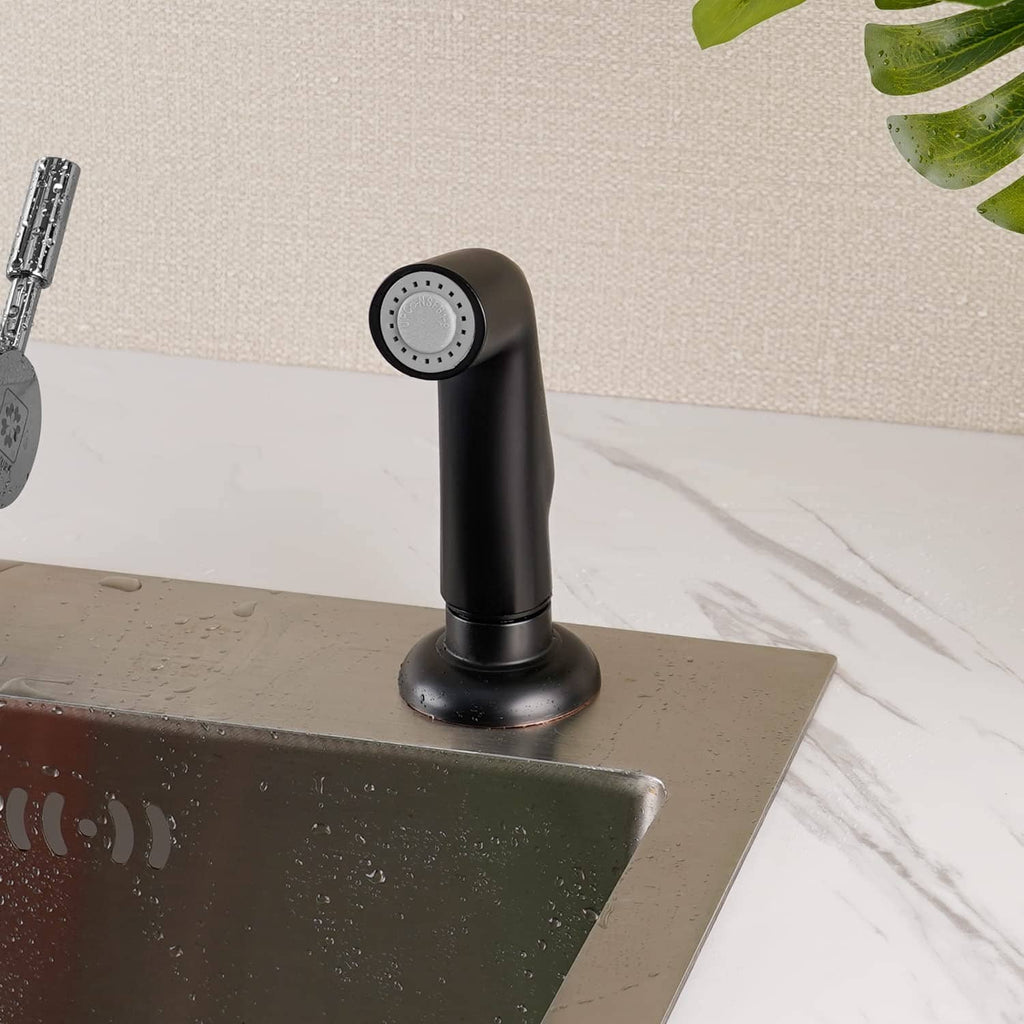 Matte black sink side sprayer head mounted on countertop