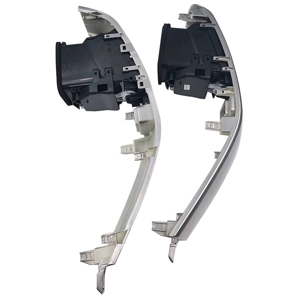 Car dashboard air vent trim panels, rear view showing mounting tabs and slots