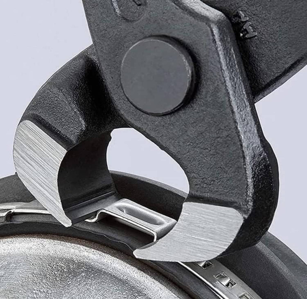 Dishwasher pump impeller with dark mounting bracket and metal blade detail