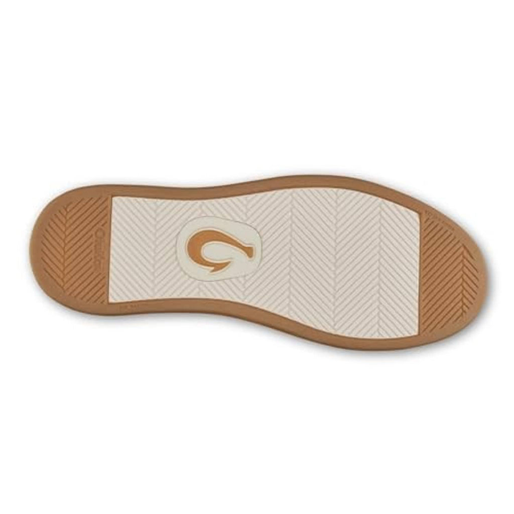 Outsole of brown leather slip-on sneaker with white stripe and traction tread