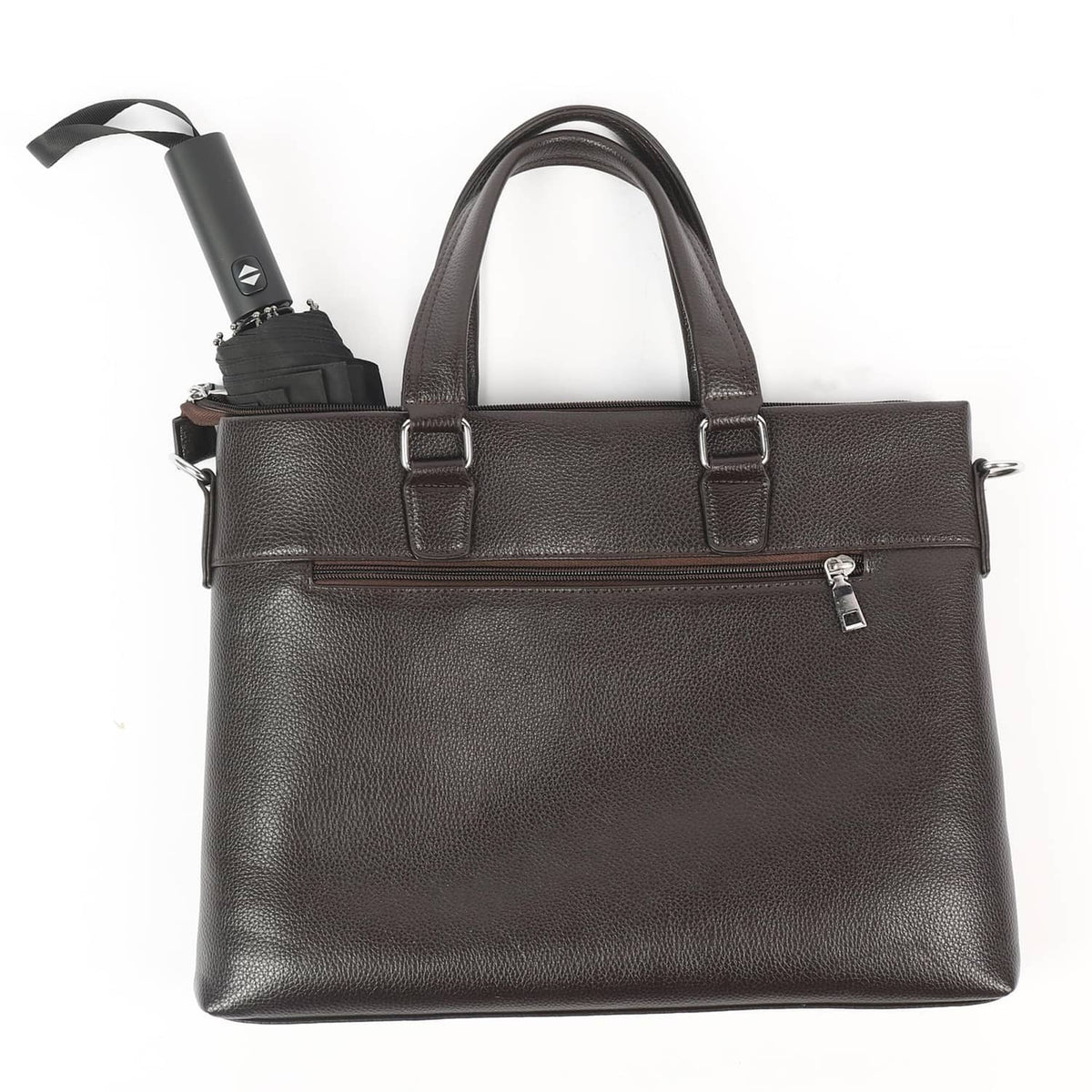 Black carrying tote bag holding a folded black umbrella