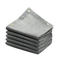 Gray sun shade cloth bundle with reinforced grommets, folded for pergola cover