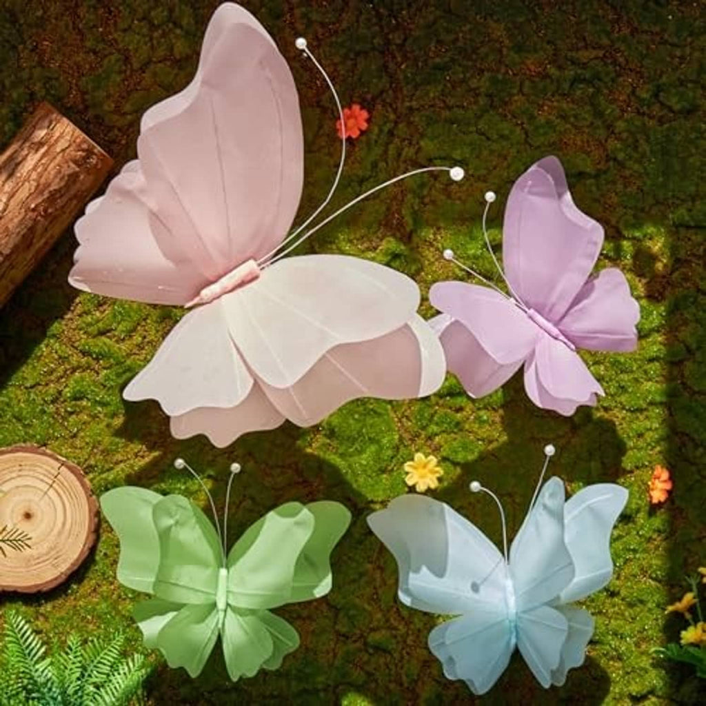 3D butterflies on wire stems in pink, lavender, green, and light blue for party decor