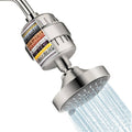 Shower head with filter cartridge, brushed nickel metal body and round spray face