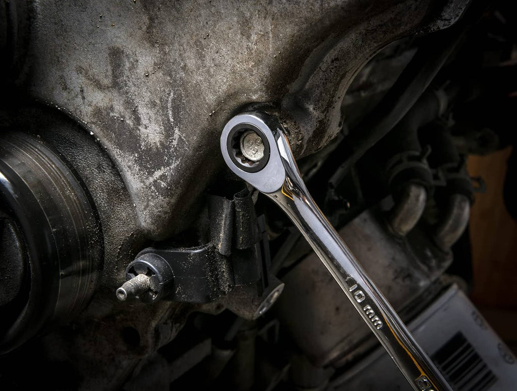 Gearwrench 10mm 12-point ratcheting double box wrench on an engine bolt