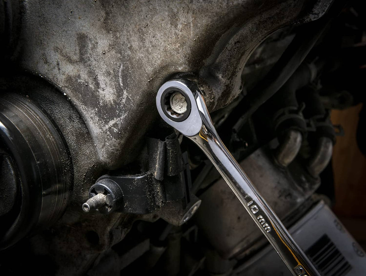 Gearwrench 10mm 12-point ratcheting double box wrench on an engine bolt