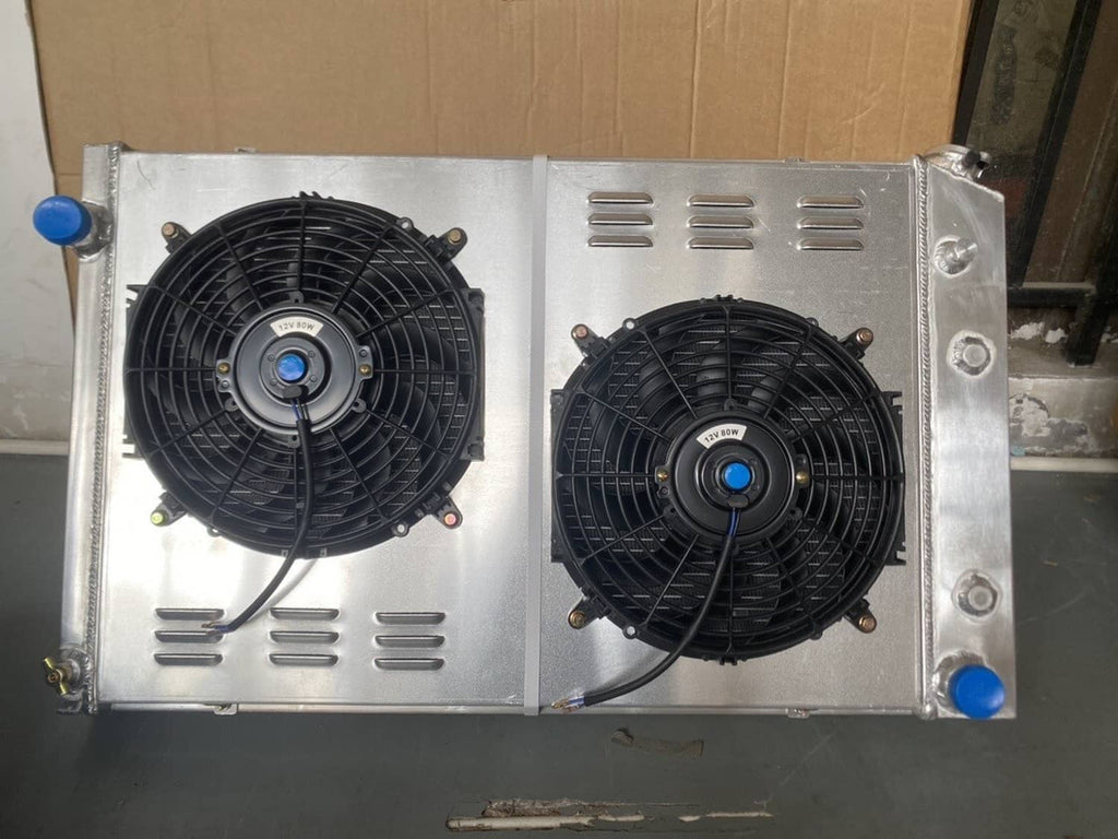 4-row radiator with two black fans on silver aluminum housing