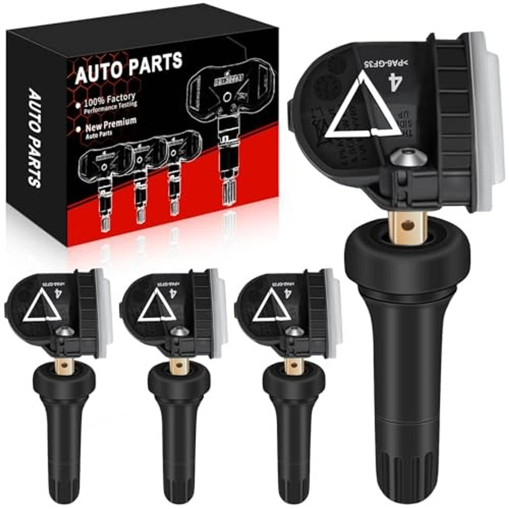 Four black TPMS sensors with metal valve stems and warning triangle icons