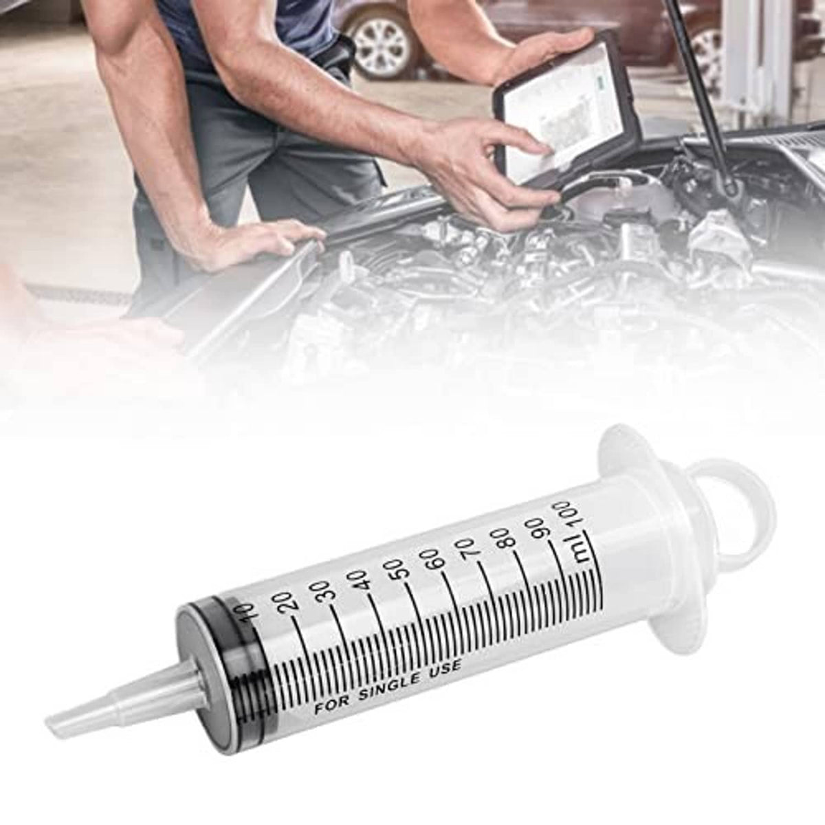 Hydraulic bleeder syringe with measurement scale and clear nozzle tip