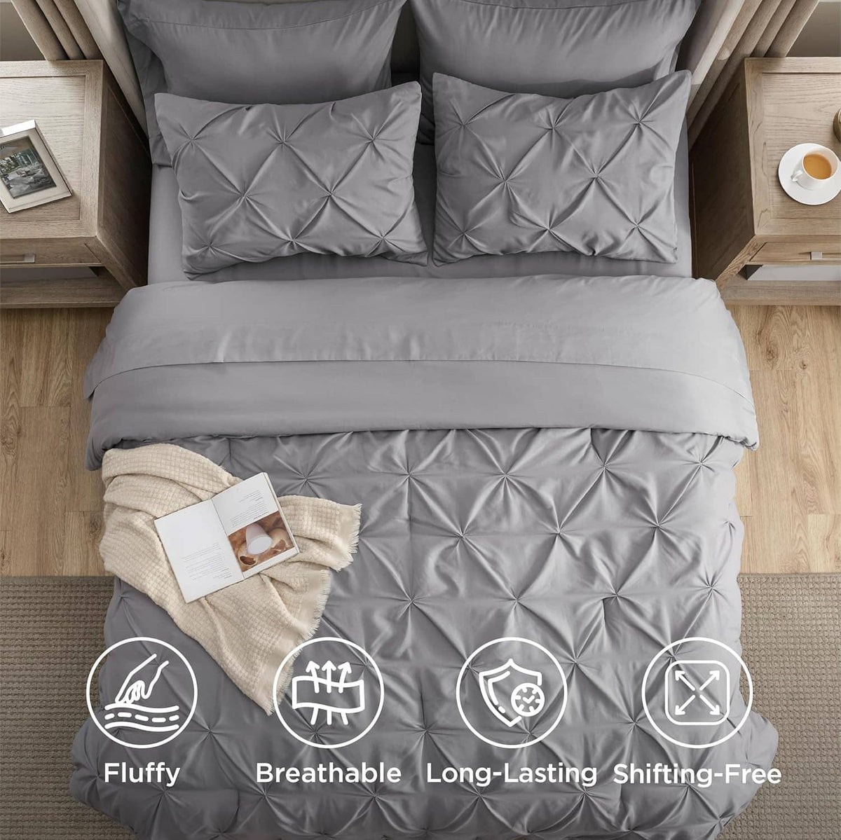 Grey queen comforter set with pinch-pleat quilted pillows and coordinated bedding