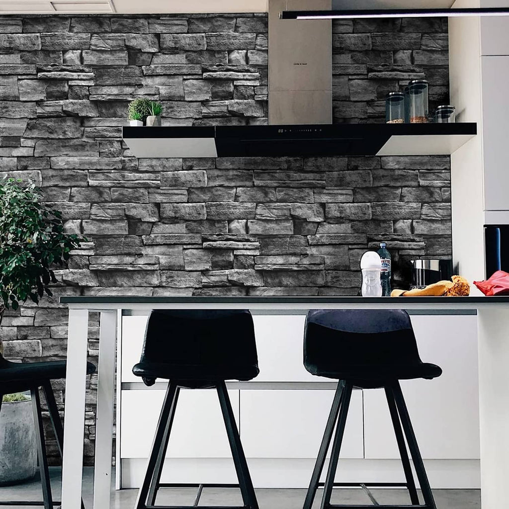 Dark gray brick-pattern wallpaper behind a kitchen counter and bar stools.