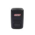 Genie door position sensor, black housing with speaker grille and textured button
