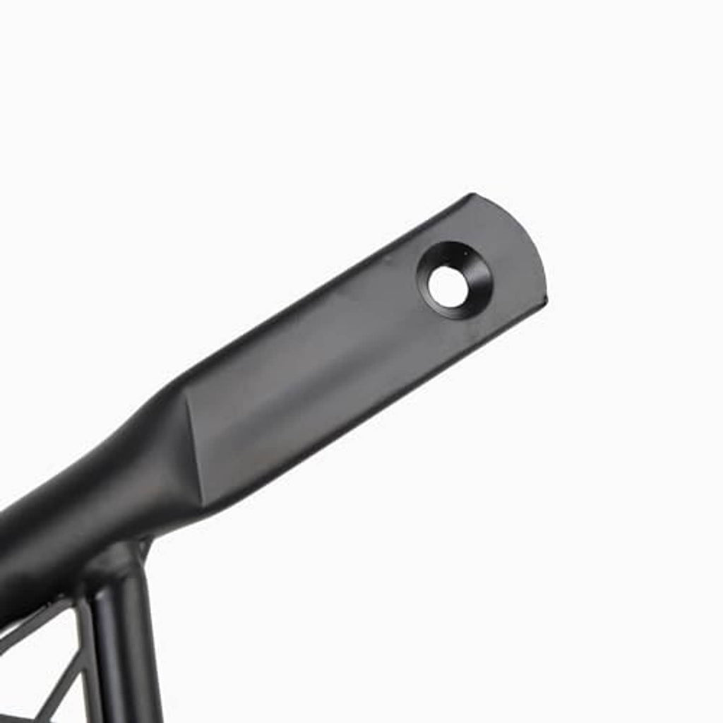 Motorcycle extended footpeg end piece, black metal with round mounting hole