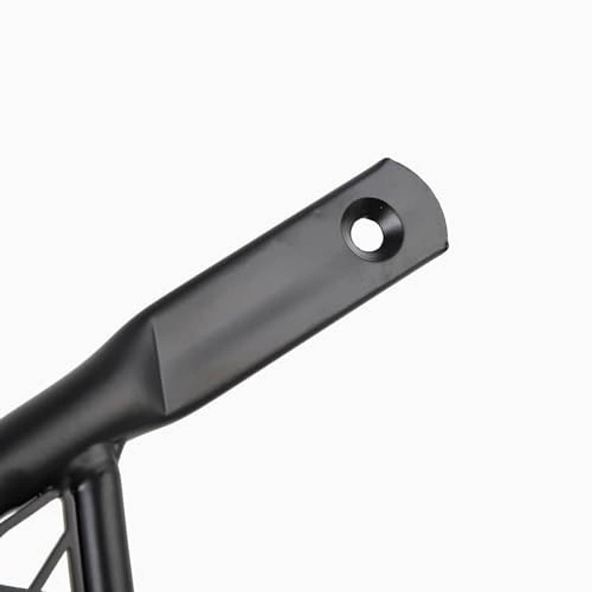 Motorcycle extended footpeg end piece, black metal with round mounting hole