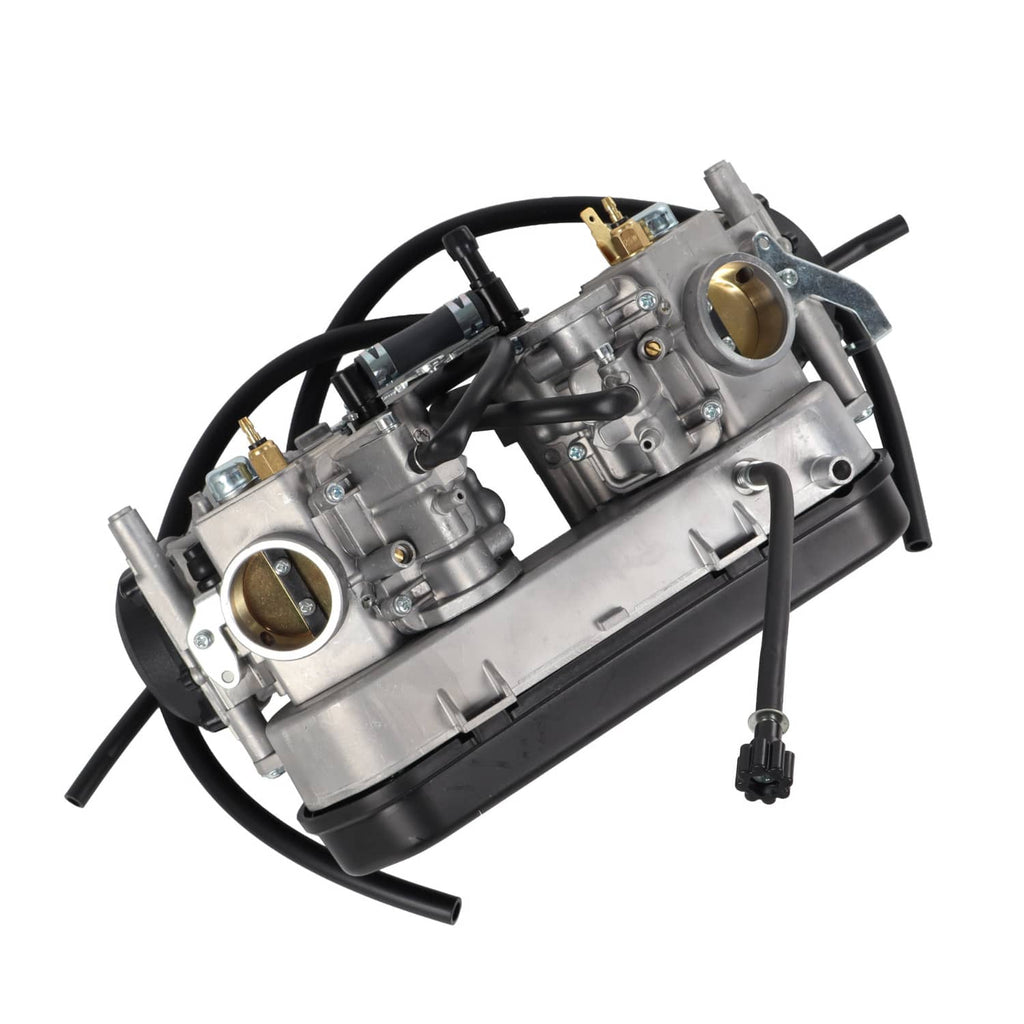 Dual carburetor assembly on intake base with brass sensors and black wiring