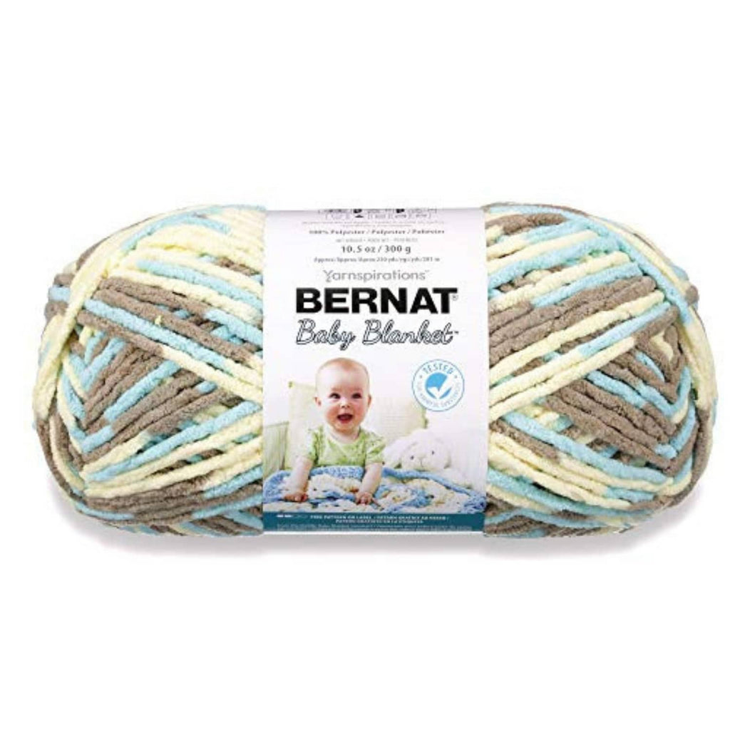 Chenille-style baby blanket yarn skein in cream, tan, blue, and pastel striped bands