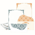 Assorted ivory stationery cards and envelopes with teal and orange decorative borders