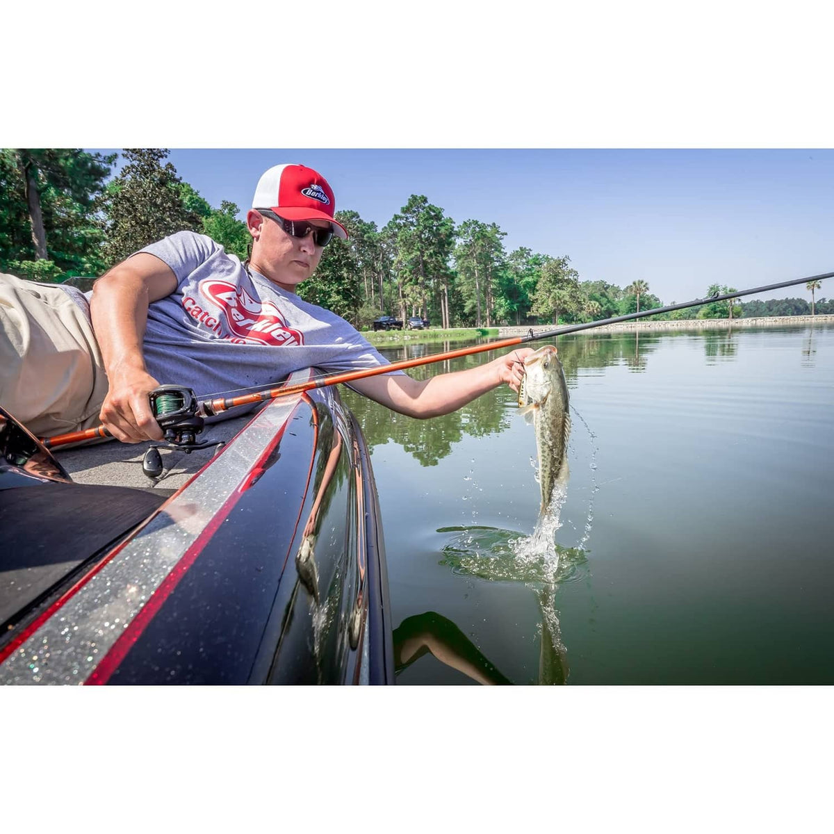 Angler reeling in a fish with a fishing rod