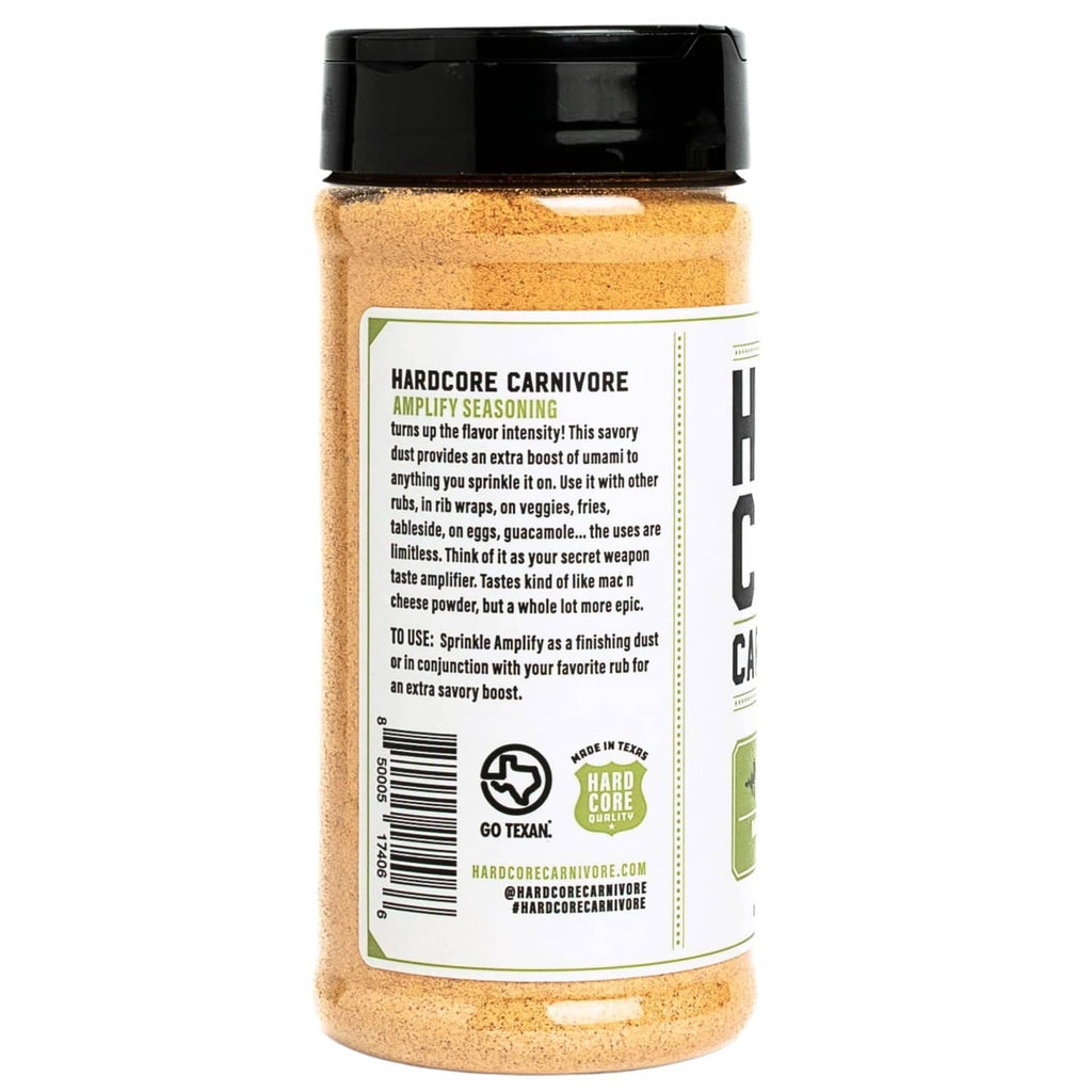 Hardcore Carnivore Amplify spice seasoning bottle with beige flavor dust, black cap