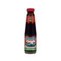 Oyster sauce bottle with red cap and illustrated front label