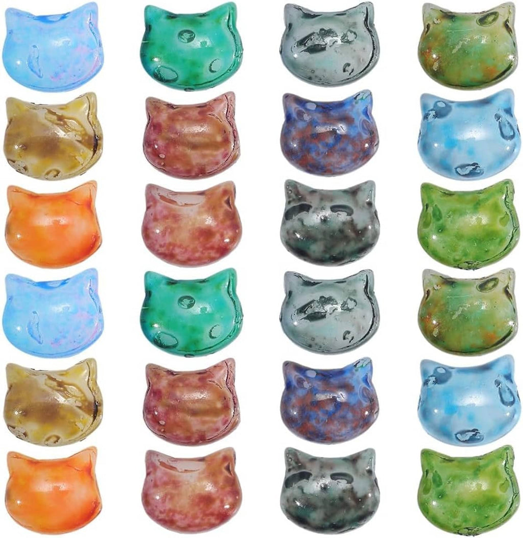 Rows of colorful cat-head glass beads with holes, assorted glossy finishes.