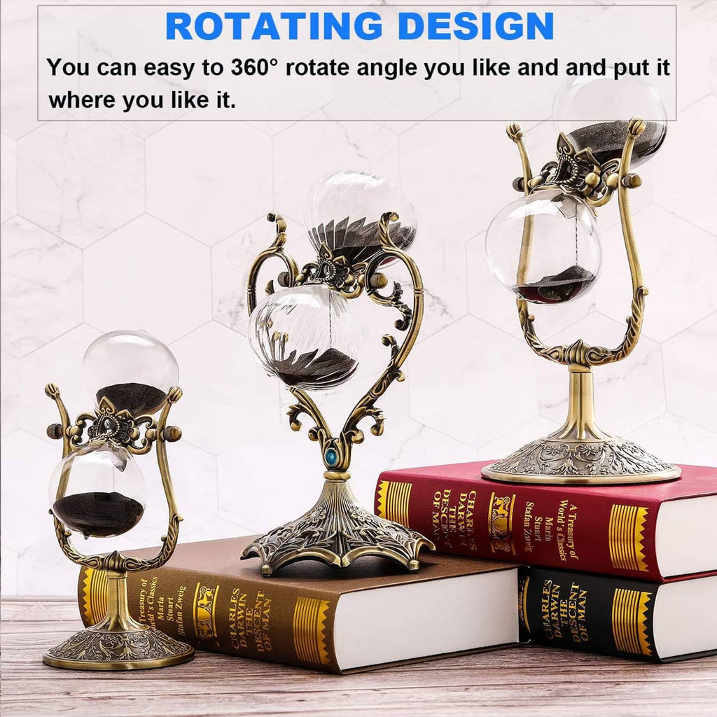 Rotating hourglass timer shown at angles with antique brass finish and blue gem accent