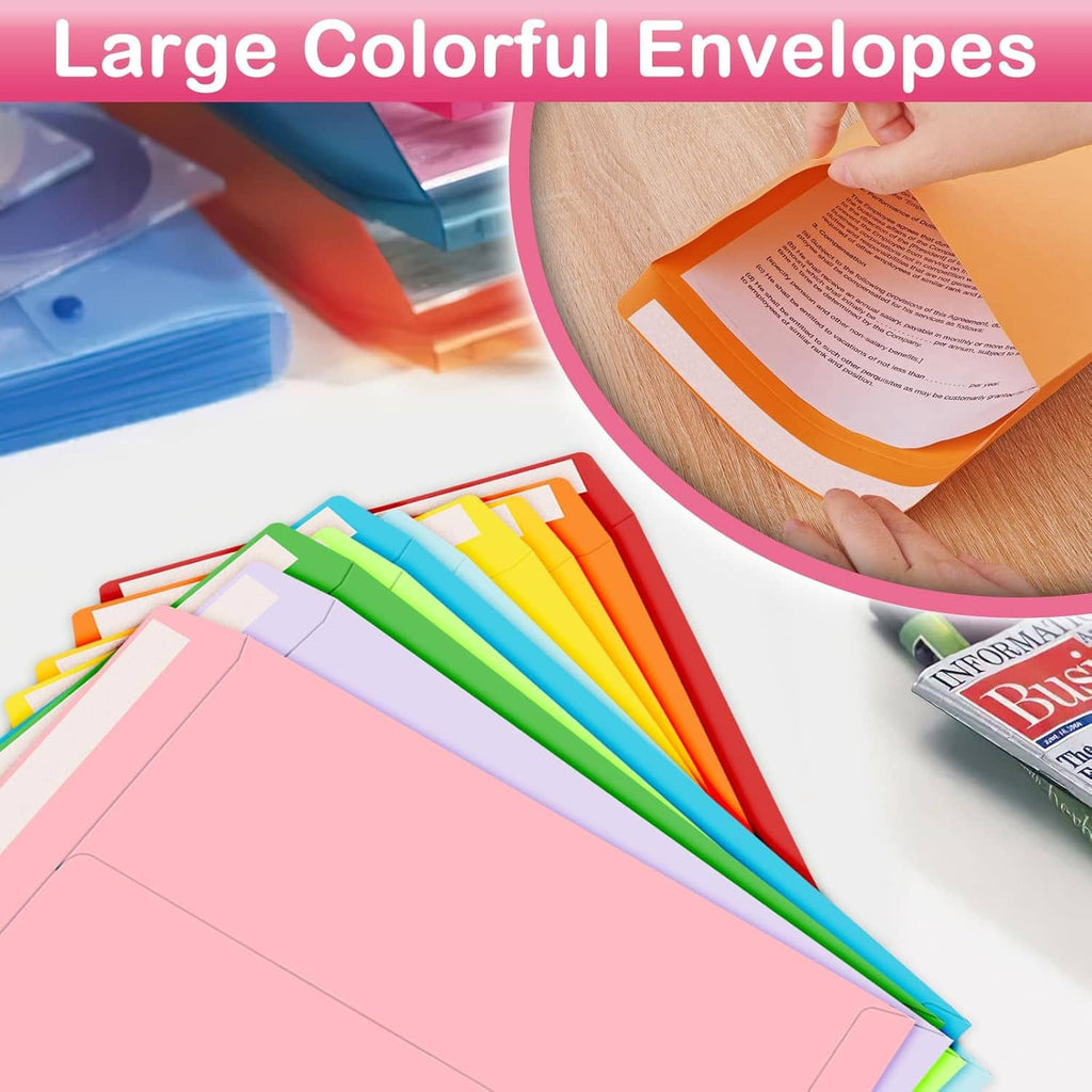 Set of large colorful envelopes with an orange envelope held in hand