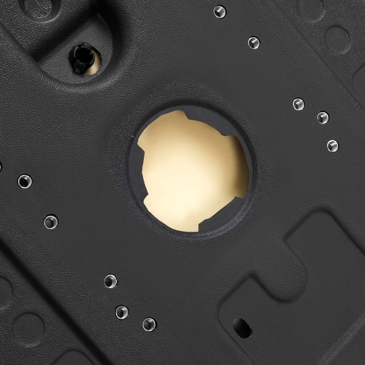 Black seat base with pre-drilled mounting holes and textured surface detail.