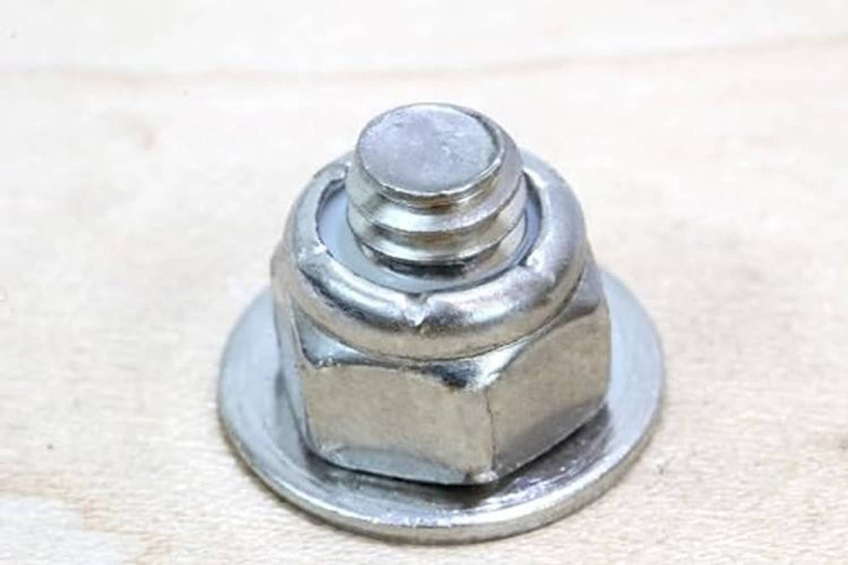 Stainless steel hex lock nut with nylon insert and #10-24 thread, close-up