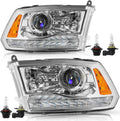 Chrome projector headlight pair with clear lens and amber side markers, includes bulbs