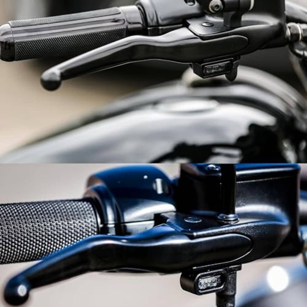 Blue-toned motorcycle brake and clutch levers close-up with switch mount