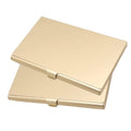 Slim gold aluminum business card holder with hinged cover and bar clasp, closed view