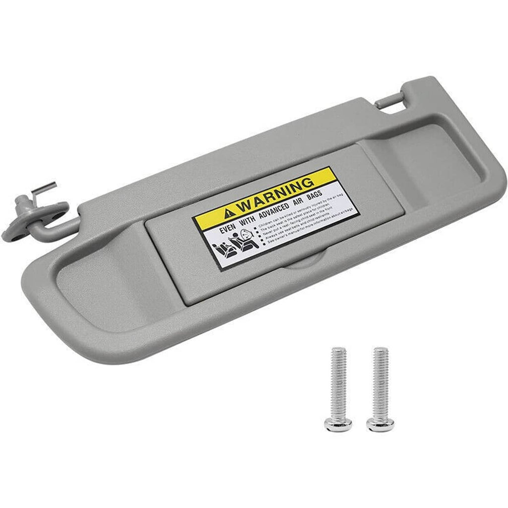 Light gray left driver-side sun visor with air bag warning label and screws