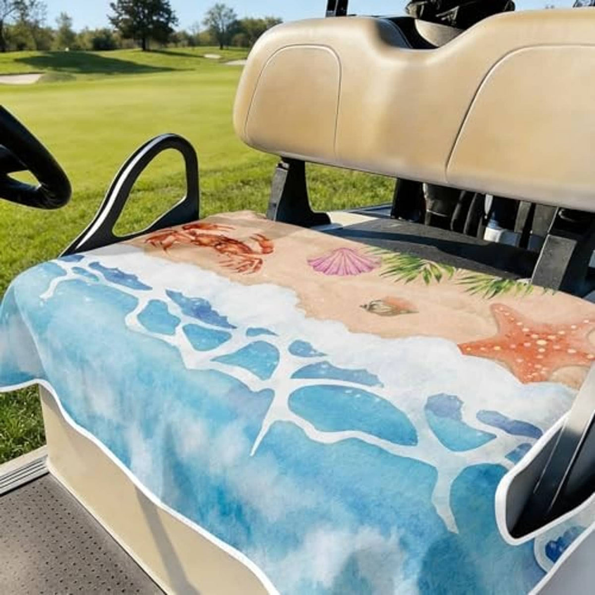 Golf cart seat cover with ocean wave print, coral crab, purple sea leaves, and starfish