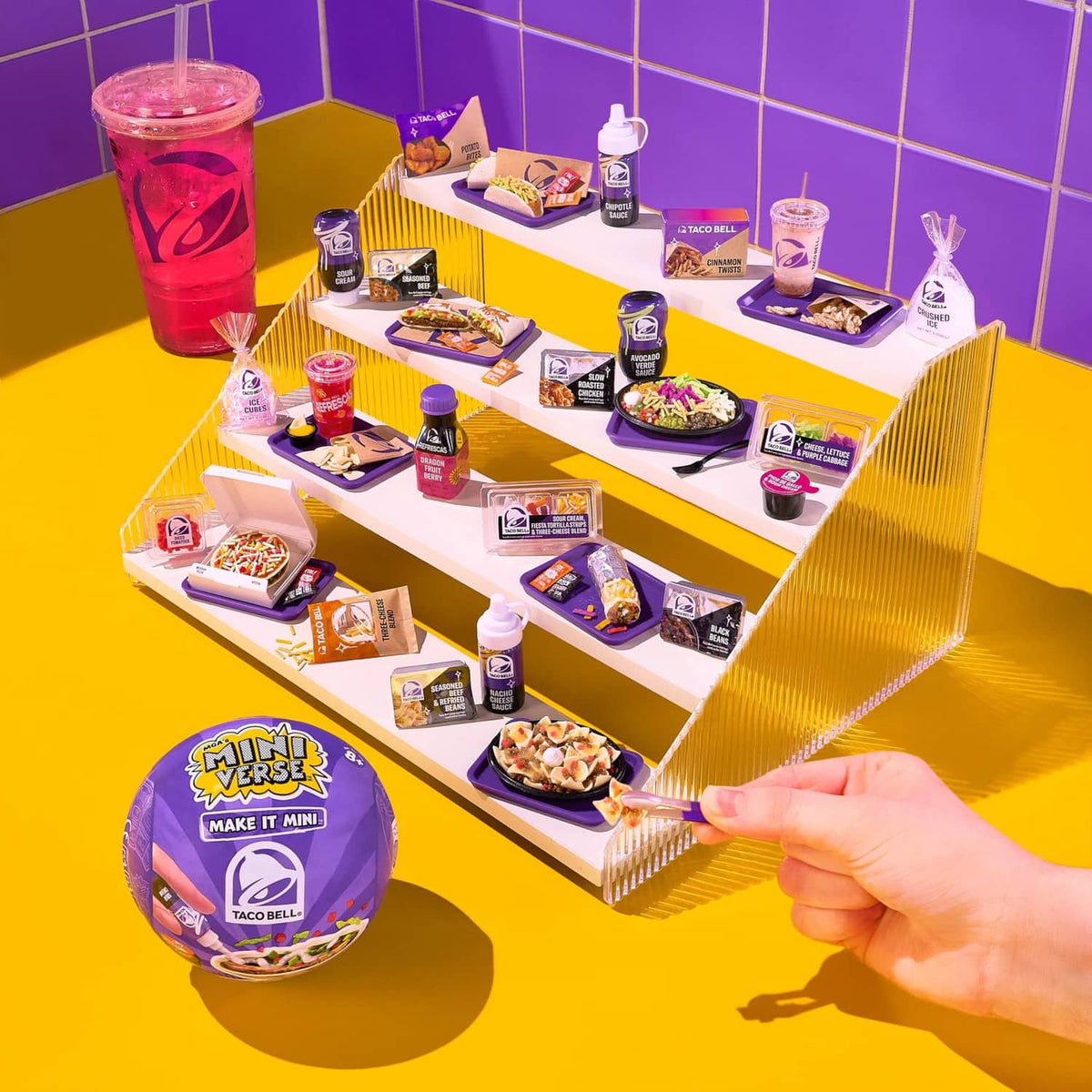 Mini Taco Bell accessory set in purple tray with mini food, bottles, and box packs