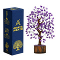 Amethyst crystal gemstone tree with purple gem leaves, silver wire branches, wooden base