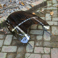 Smoked dark motorcycle windshield with chrome mounting brackets and support legs