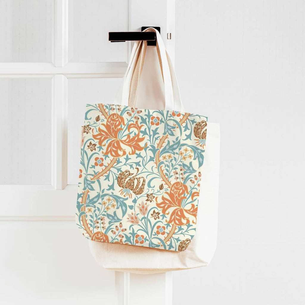 Floral cotton tote bag with orange and teal botanical print